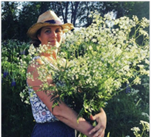 Maria Mehlin med blomsterbukett